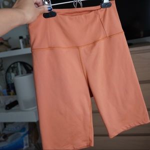 Girlfriend collective peach bike shorts